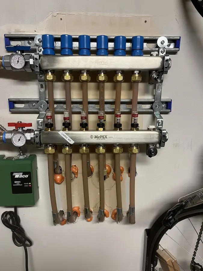 Plumber performing Gas Line Installation at a residential property in Colesville